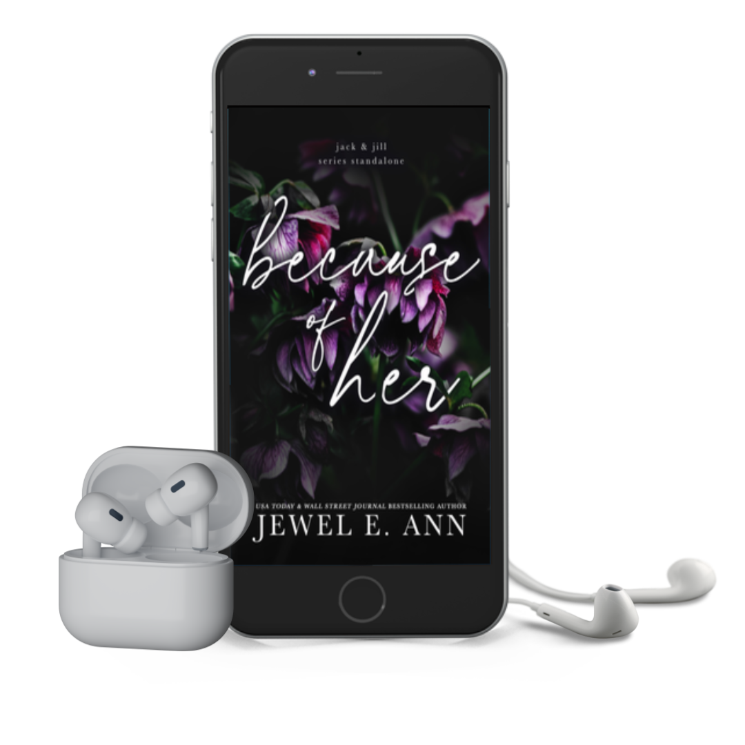 Mockup of a phone and earbuds with the Because of Her cover by Jewel E Ann, a romantic suspense audiobook