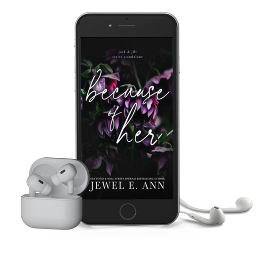 Mockup of a phone and earbuds with the Because of Her cover by Jewel E Ann, a romantic suspense audiobook