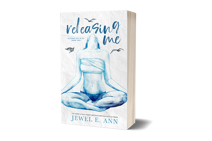 paperback mockup of the cover of Releasing Me by Jewel E. Ann, a contemporary romance