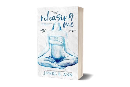 paperback mockup of the cover of Releasing Me by Jewel E. Ann, a contemporary romance