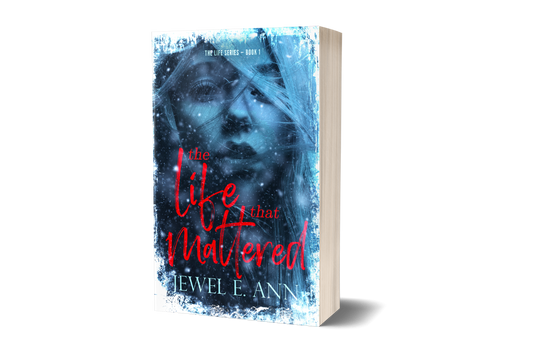 Paperback book mockup up of a cover of The Life That Mattered by Jewel E. Ann a romantic suspense.
