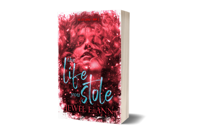 Paperback book mockup up of a cover of The Life You Stole by Jewel E. Ann a romantic suspense.
